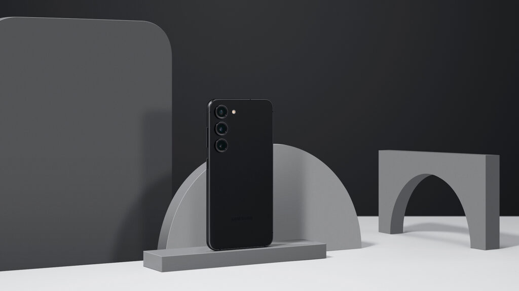 Samsung Galaxy S23 na cor preta com formas geométricas em tons de cinza ao seu redor