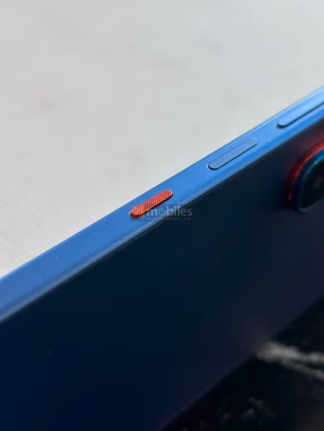 Um botão vermelho na lateral de um celular azul