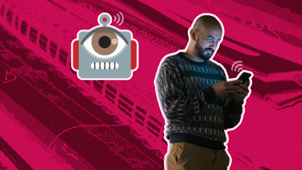 Um homem usa o celular enquanto um robô espiona por trás dele. Há um sinal de transmissão de dados do celular para o robô