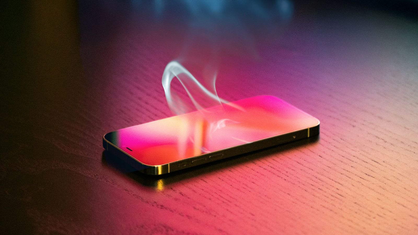 Um iPhone em uma mesa com fumaça saindo da tela
